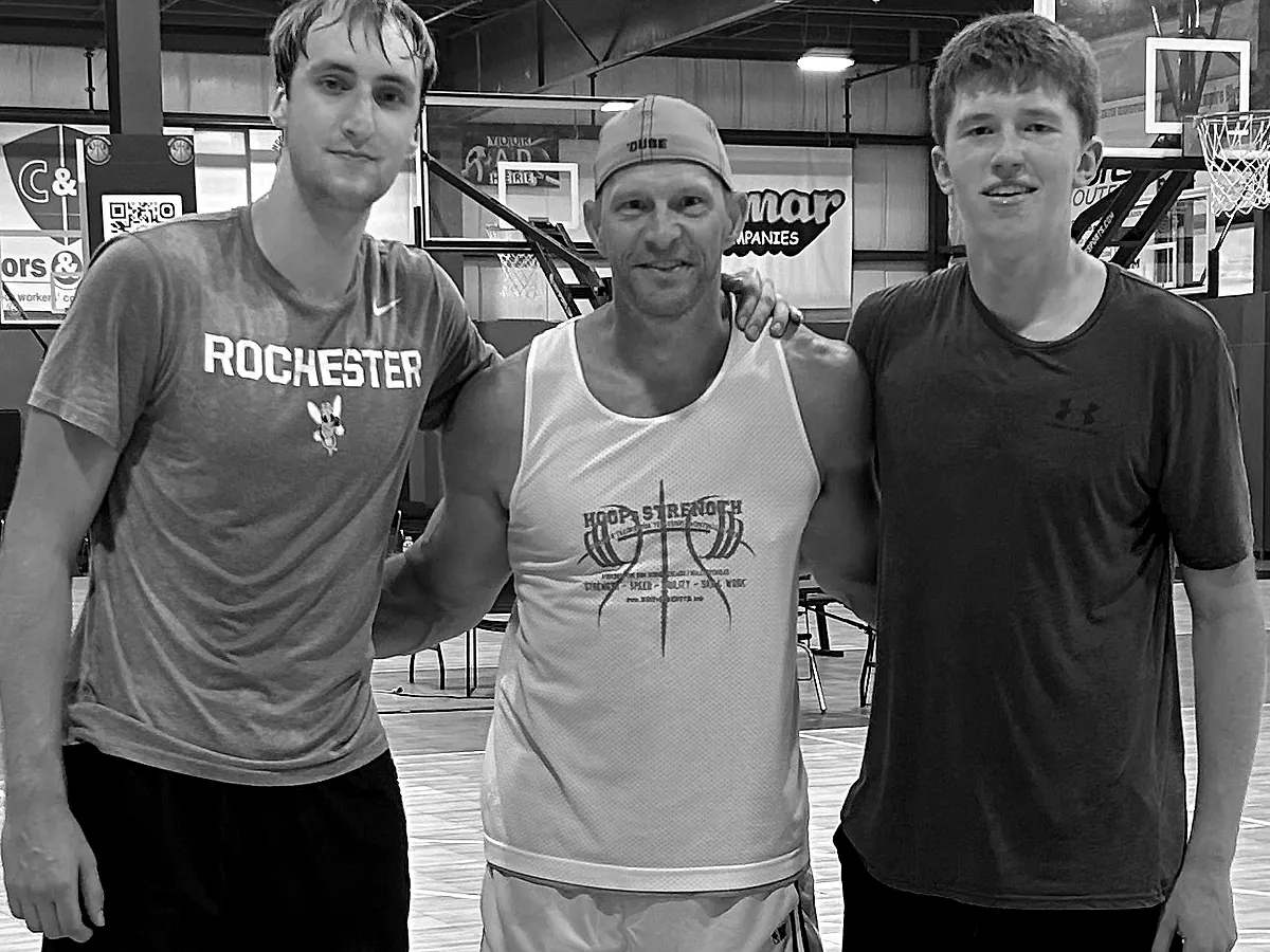 Matt Jones with two of his college players on the Hoops Strength court